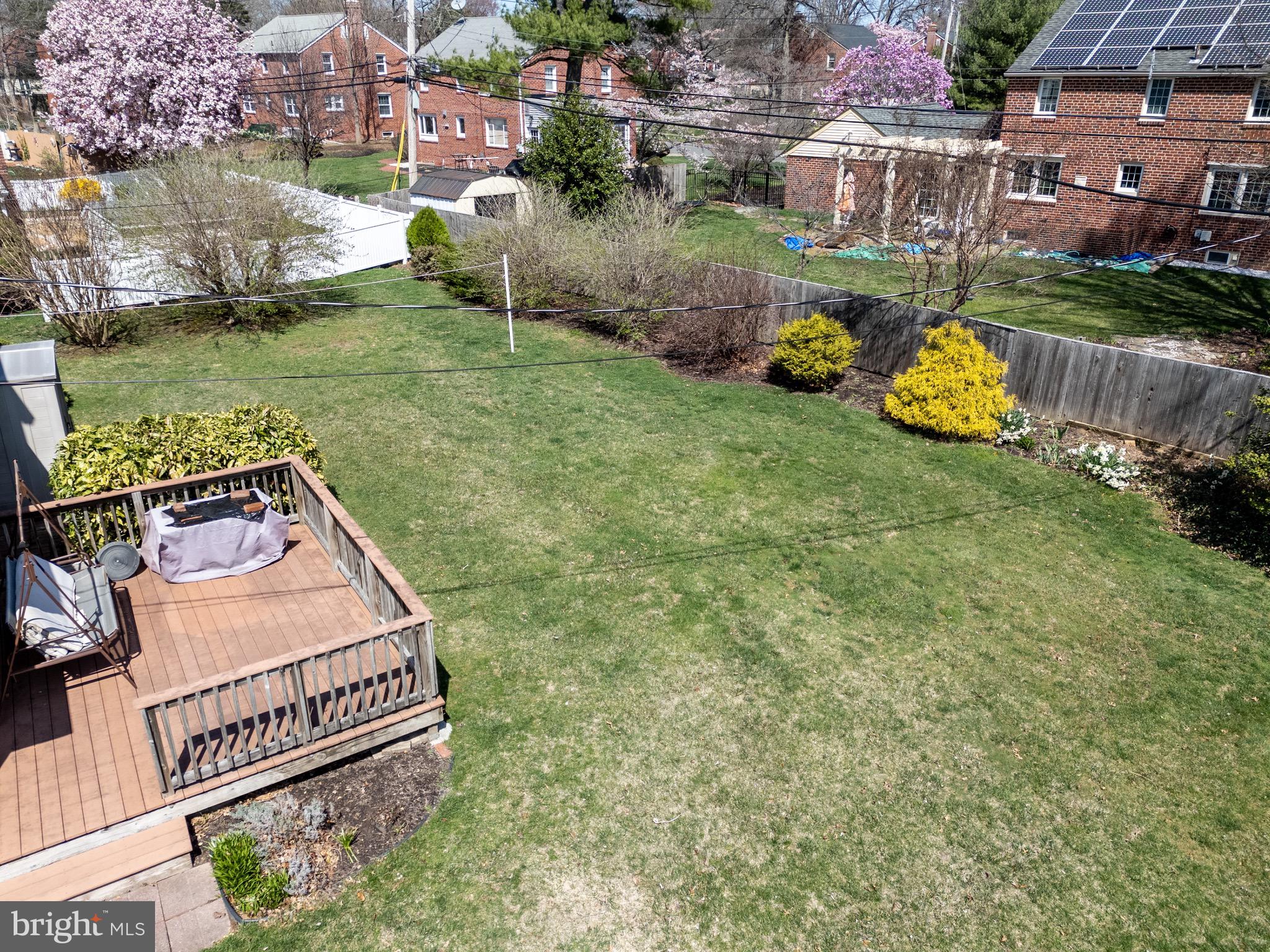 121 Devonshire Road Wilmington, DE 19803 - Photo 28 of 31 a backyard of a house with lots of green space and fountain