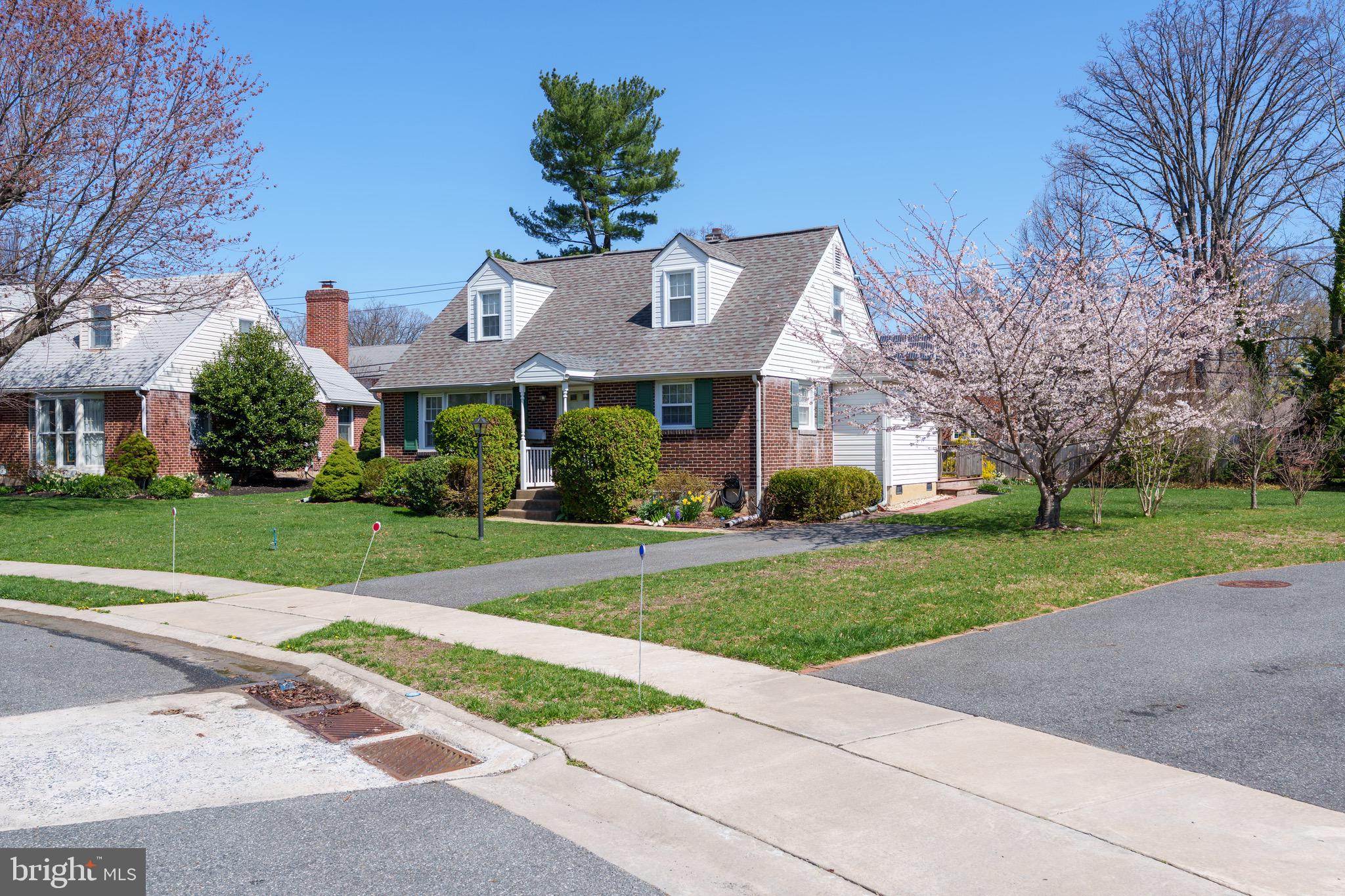 121 Devonshire Road Wilmington, DE 19803 - Photo 3 of 31 a front view of house with yard and green space