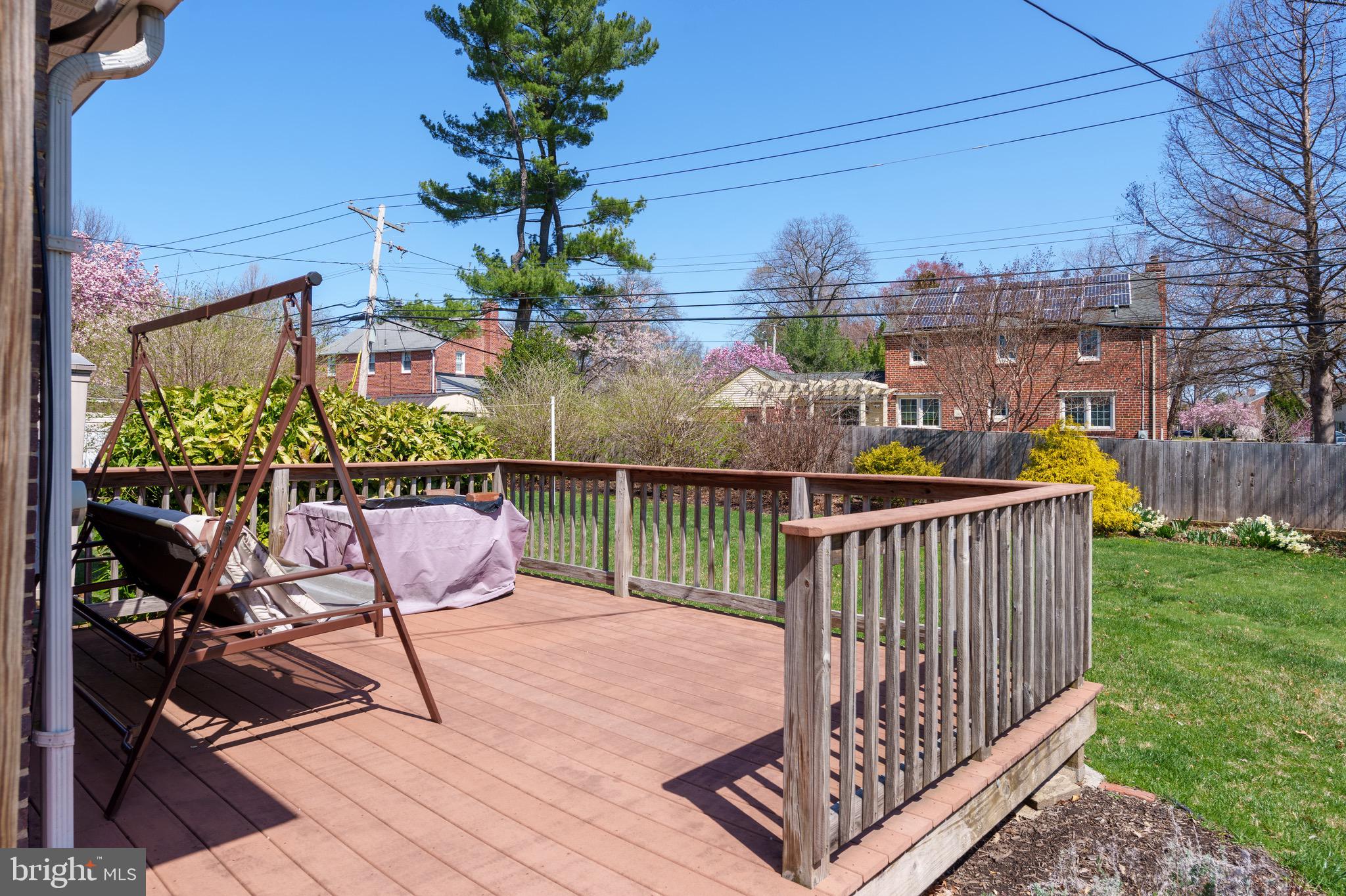 121 Devonshire Road Wilmington, DE 19803 - Photo 5 of 31 a view of a balcony with wooden floor and outdoor seating