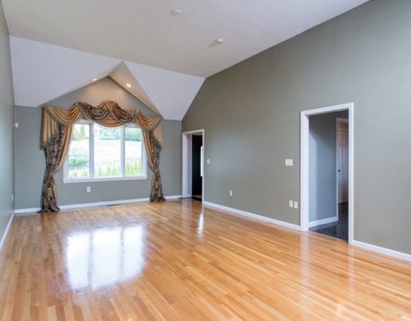 129 Raffaele Drive Waltham, MA 02452 - Photo 15 of 20 wooden floor in an empty room with a window