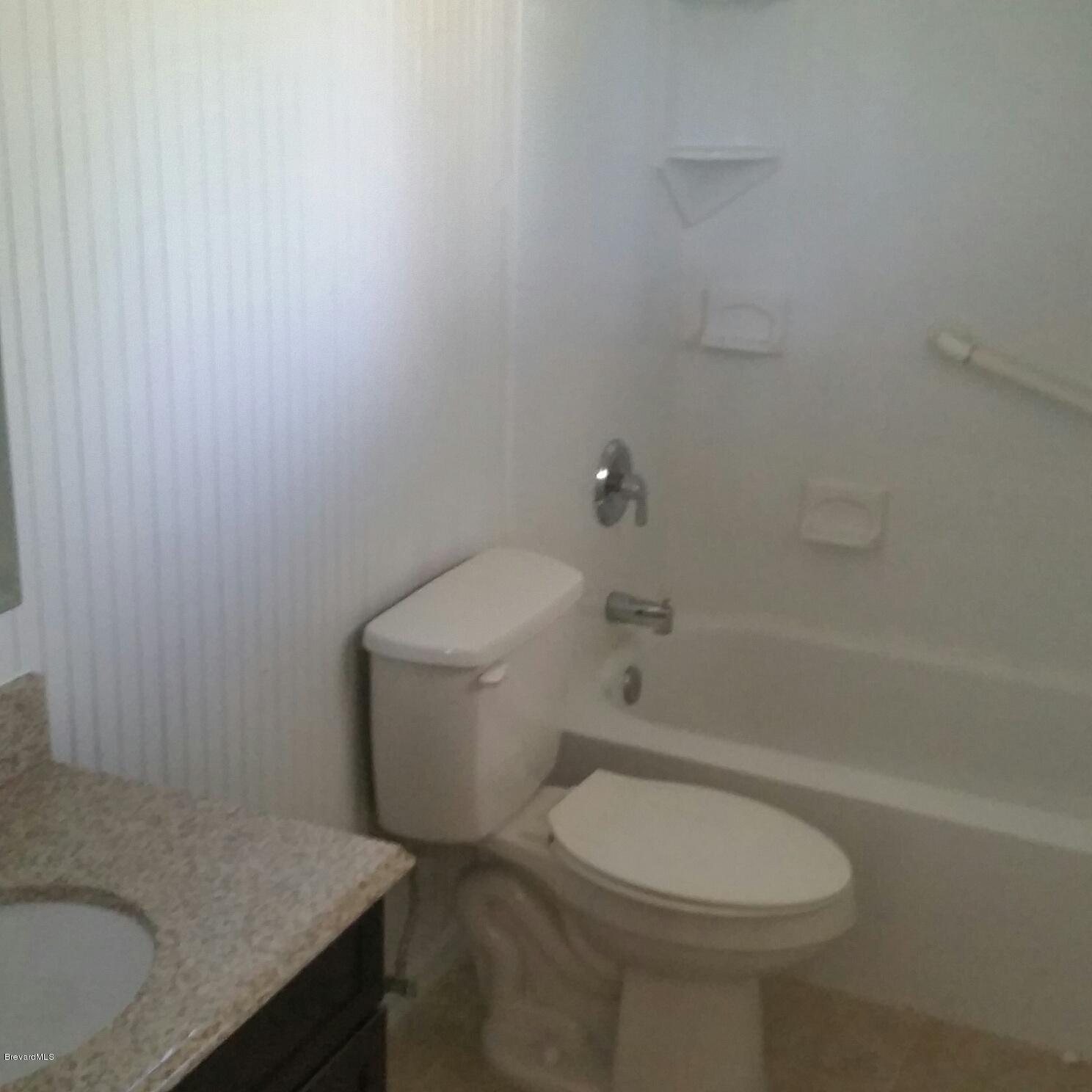 1031 Commerce Road Southeast Palm Bay, FL 32909 - Photo 9 of 13 Master Bathroom