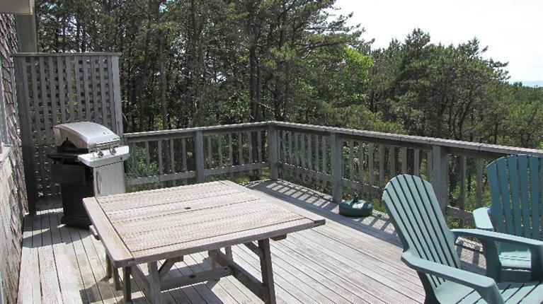 63 Old County Road Truro, MA 02666 - Photo 28 of 30 a view of balcony with wooden floor and outdoor seating