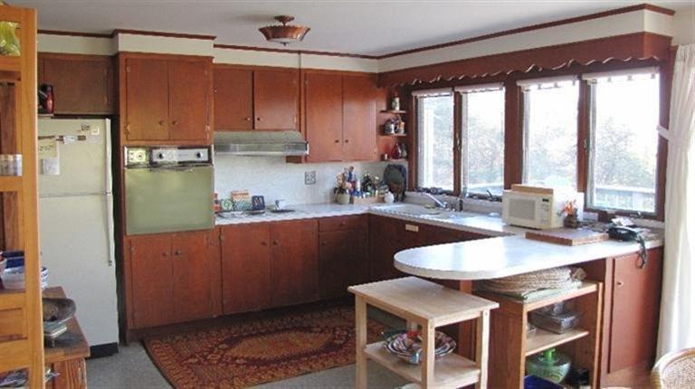 63 Old County Road Truro, MA 02666 - Photo 5 of 30 a kitchen with stainless steel appliances granite countertop a sink refrigerator and cabinets