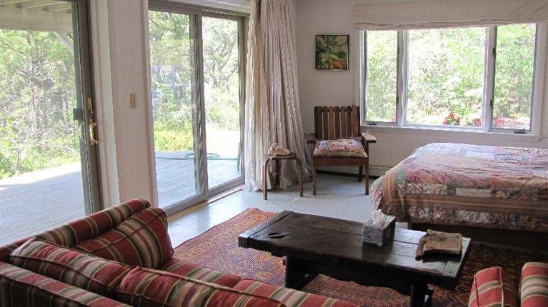 63 Old County Road Truro, MA 02666 - Photo 7 of 30 a living room with furniture and a window