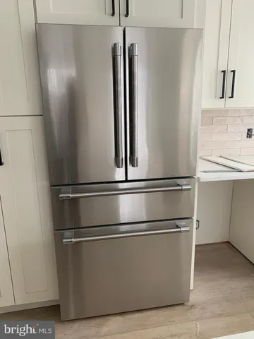 a view of a room with rack on the wall