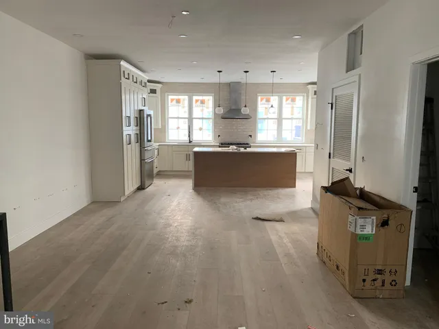 a bathroom with a tub and shower