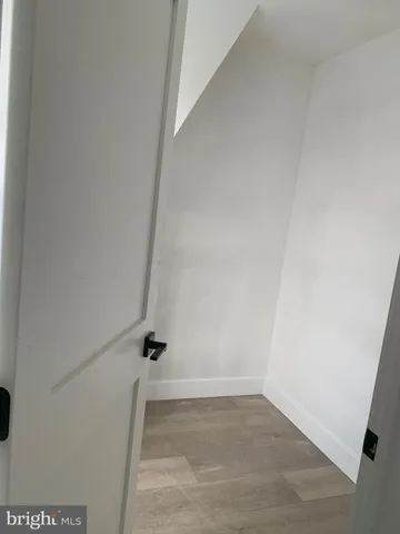 a white bath tub sitting next to a window