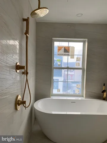 a view of a room with closet and refrigerator