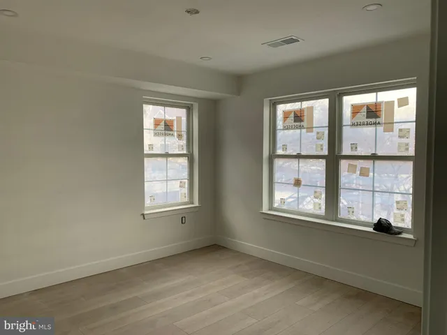 a view of kitchen and hall with furniture