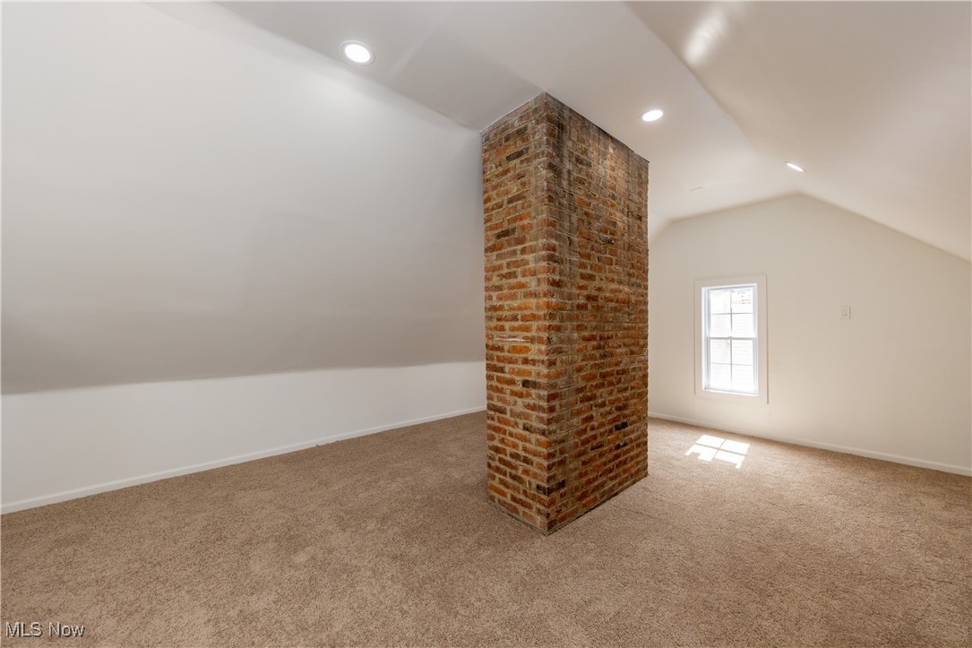 3694 Chelton Road Cleveland, OH 44120 - Photo 28 of 33 Bonus room featuring carpet, baseboards, vaulted ceiling, and recessed lighting