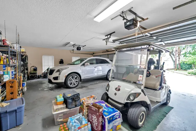 a car and bike parked in a garage
