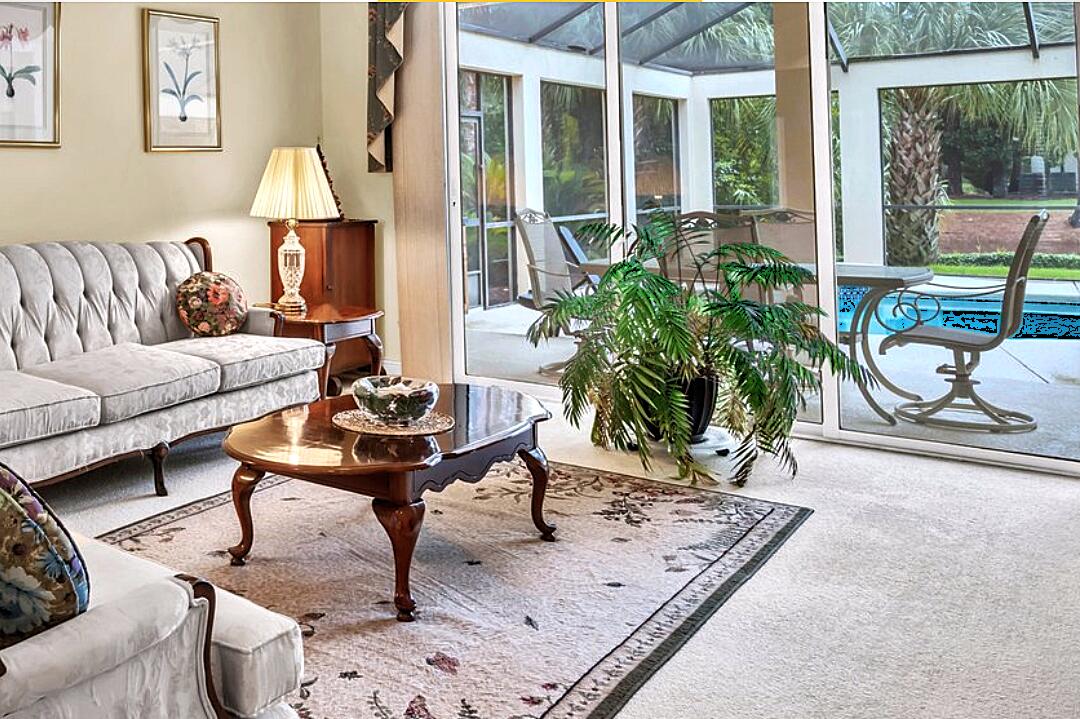 423 Maritime Court Destin, FL 32541 - Photo 6 of 39 a living room with furniture and a large window