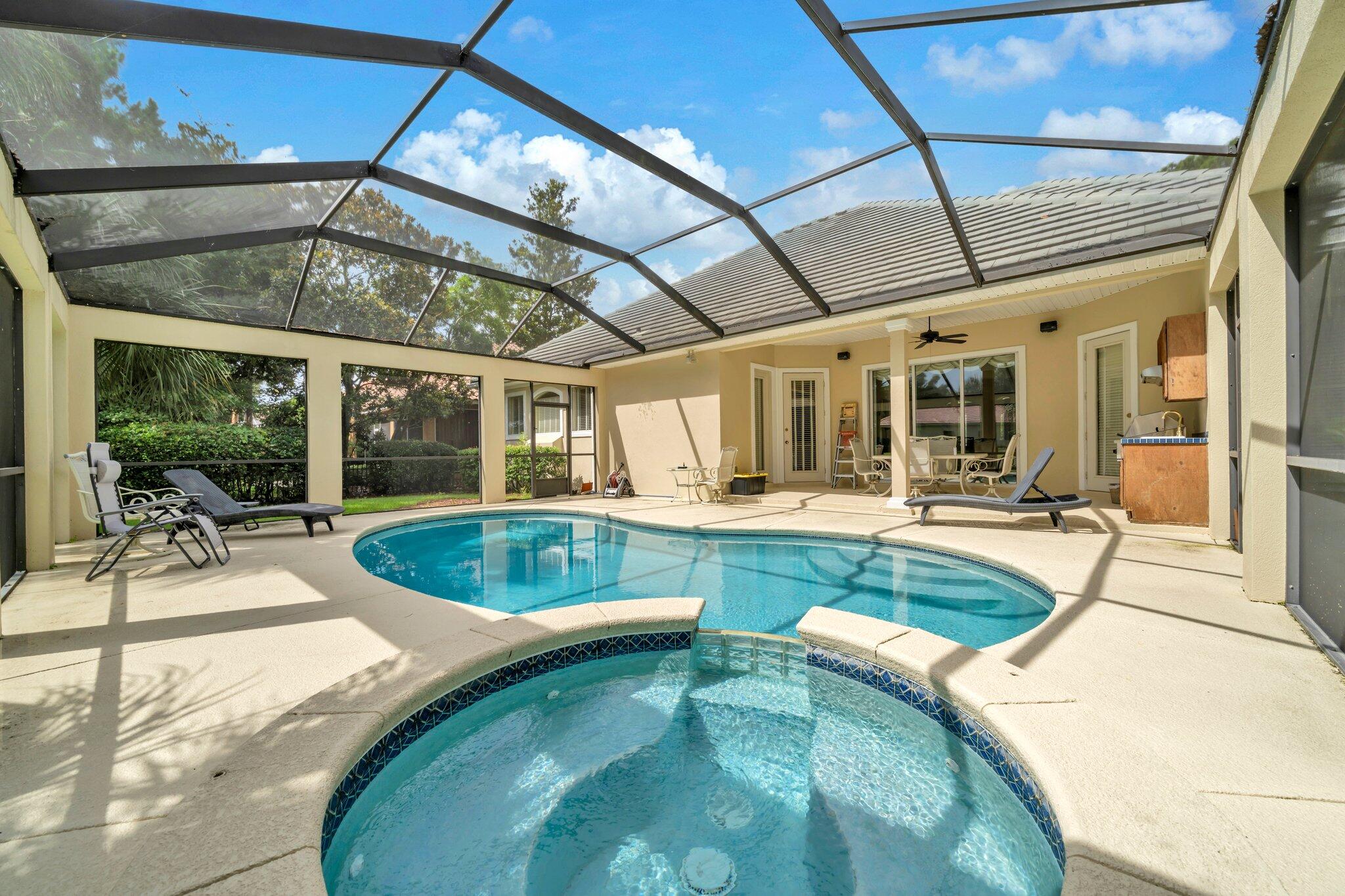 423 Maritime Court Destin, FL 32541 - Photo 9 of 39 a view of a swimming pool with a patio