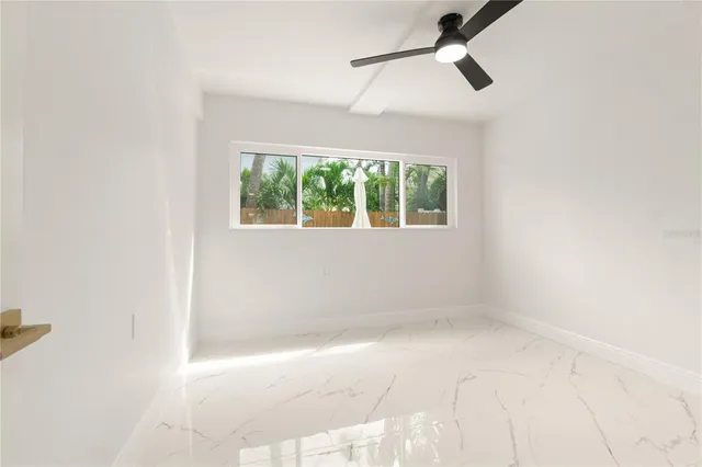 a view of livingroom with furniture and windows