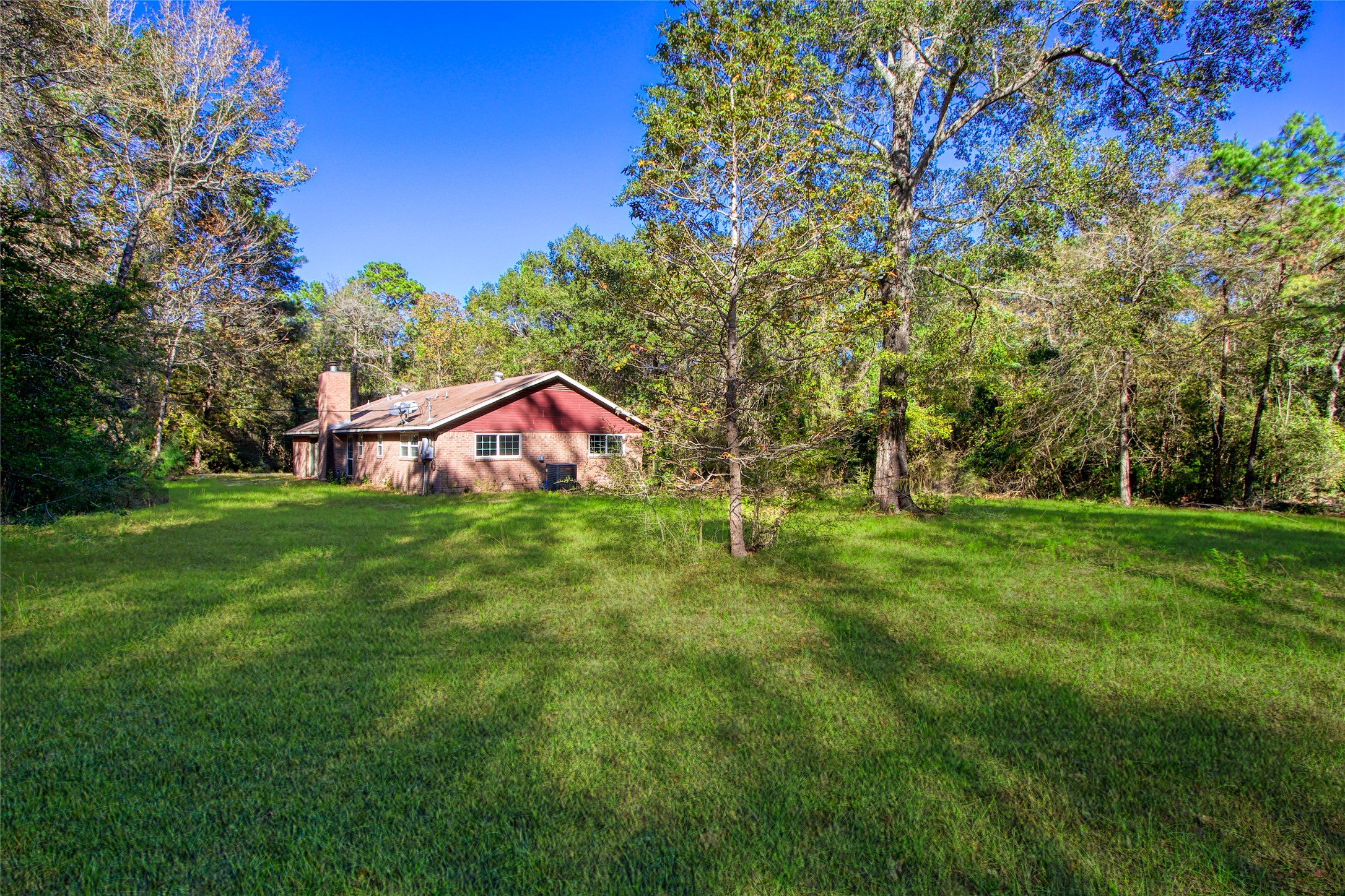 40015 Gable Circle Magnolia, TX 77354 - Photo 19 of 19 a view of a house with a yard and sitting area