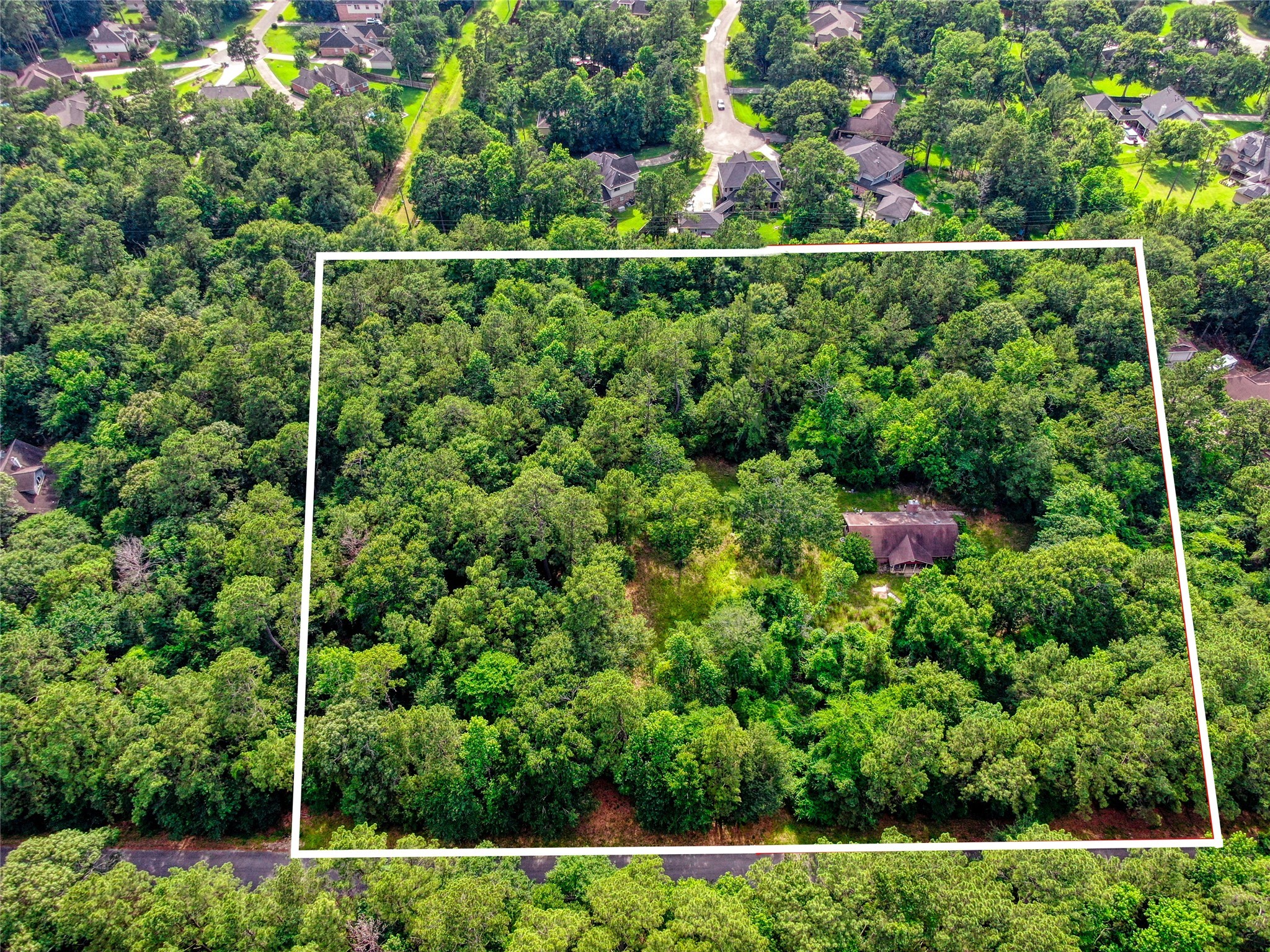40015 Gable Circle Magnolia, TX 77354 - Photo 3 of 19 a view of a fence and a garden
