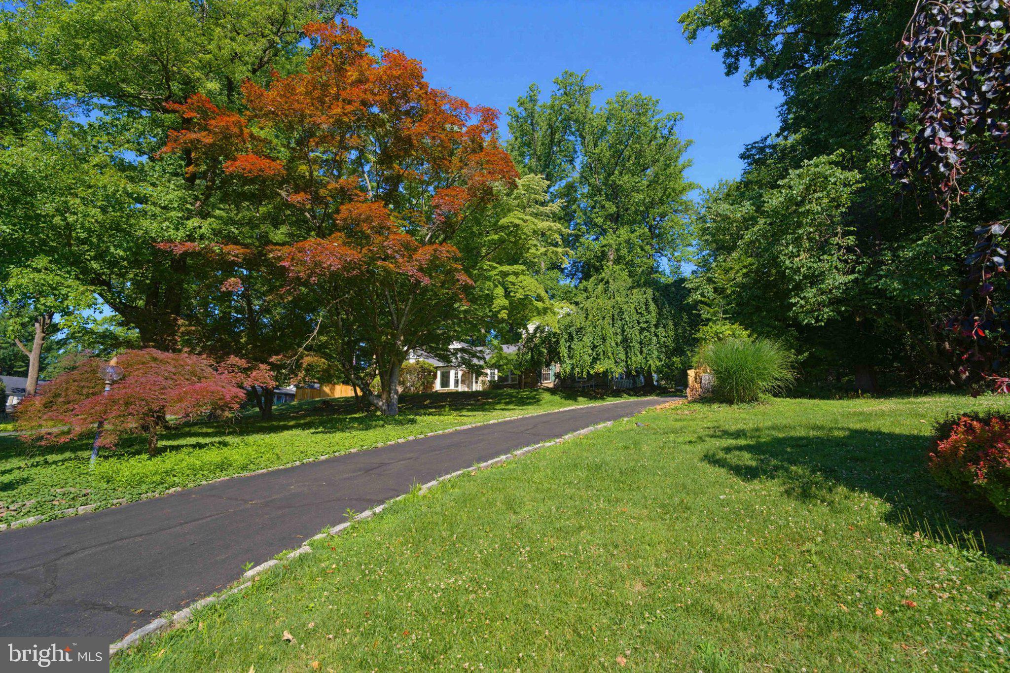 1268 Rydal Road Jenkintown, PA 19046 - Photo 3 of 31 a view of a field of grass and trees