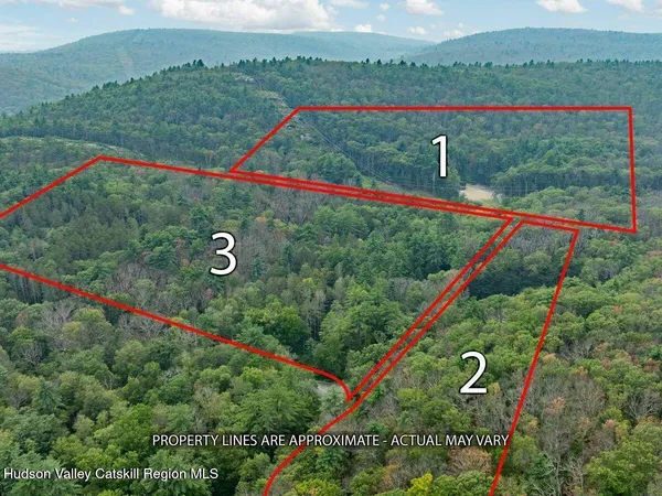 a kitchen with kitchen island a sink stainless steel appliances and cabinets
