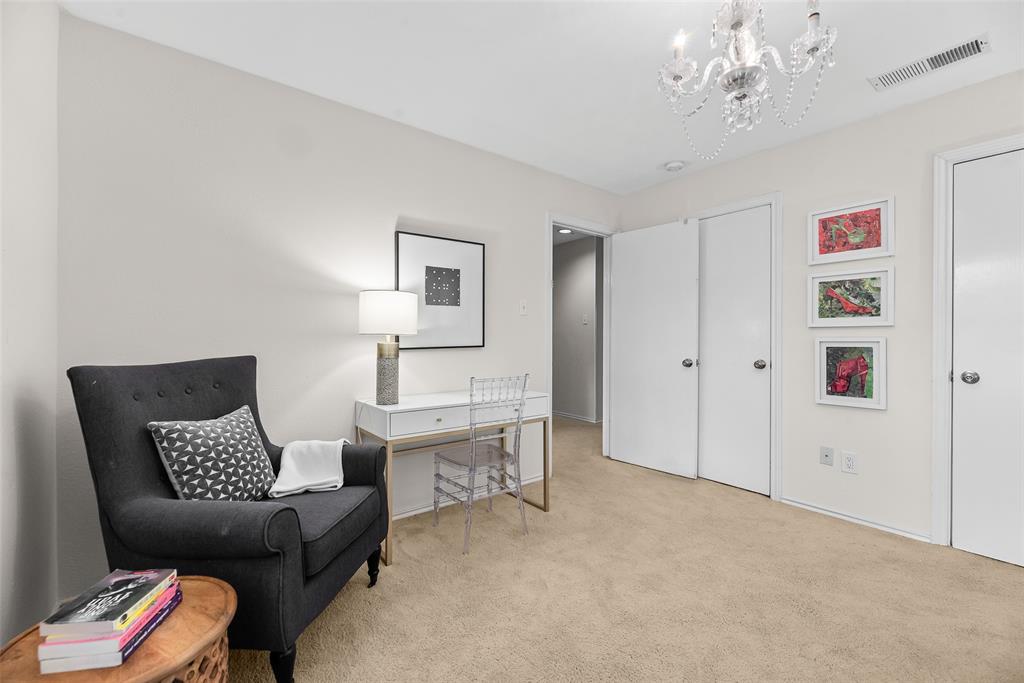 9315 Moss Cir Drive Dallas, TX 75243 - Photo 26 of 36 a living room with furniture and a chandelier