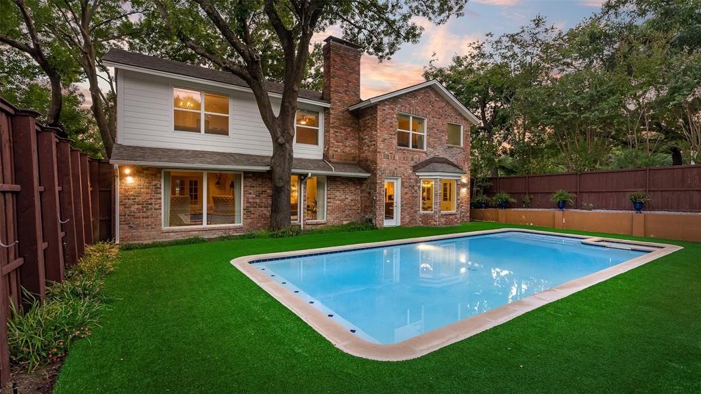 9315 Moss Cir Drive Dallas, TX 75243 - Photo 31 of 36 a view of a house with a swimming pool