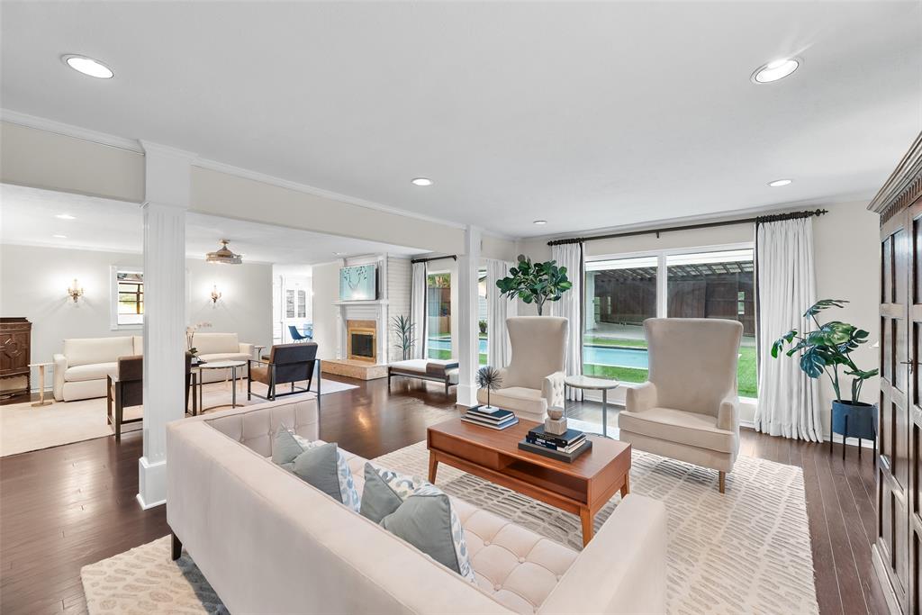 9315 Moss Cir Drive Dallas, TX 75243 - Photo 6 of 36 a living room with furniture and a table