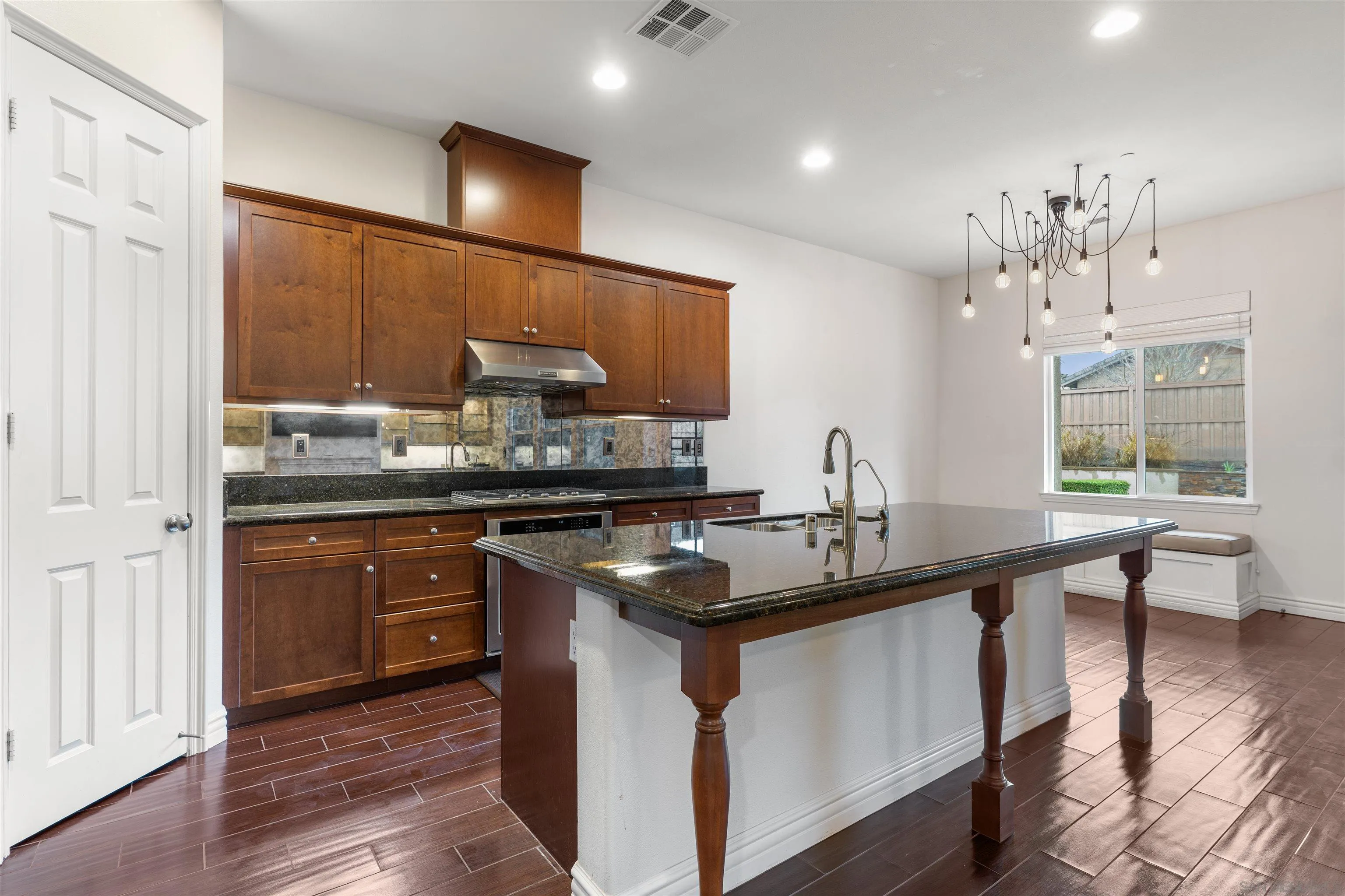 2067 James Gaynor Street Fallbrook, CA 92028 - Photo 11 of 33 a kitchen with stainless steel appliances granite countertop a sink and stove