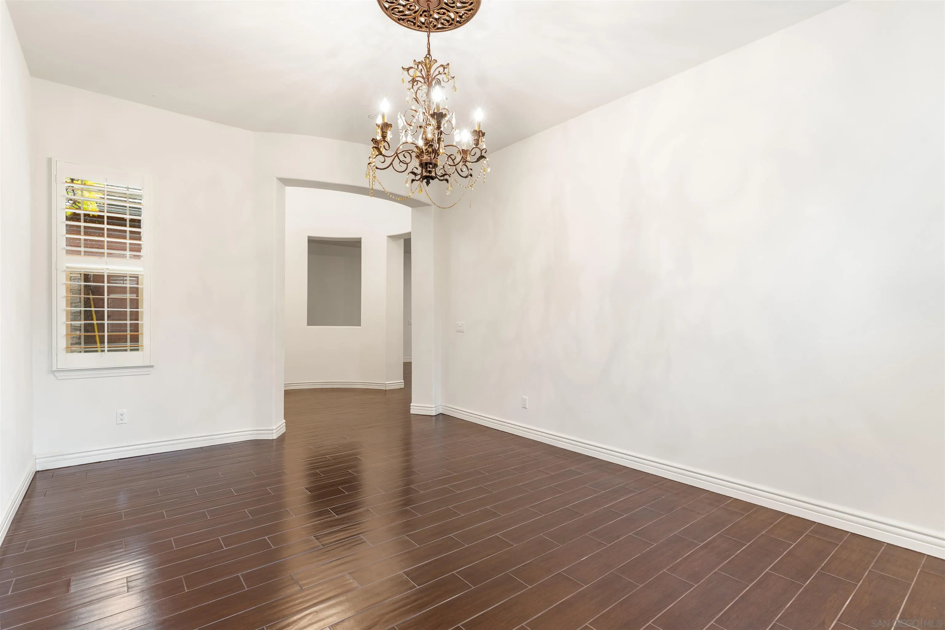 2067 James Gaynor Street Fallbrook, CA 92028 - Photo 15 of 33 a view of a livingroom with a chandelier wooden floor and chandelier