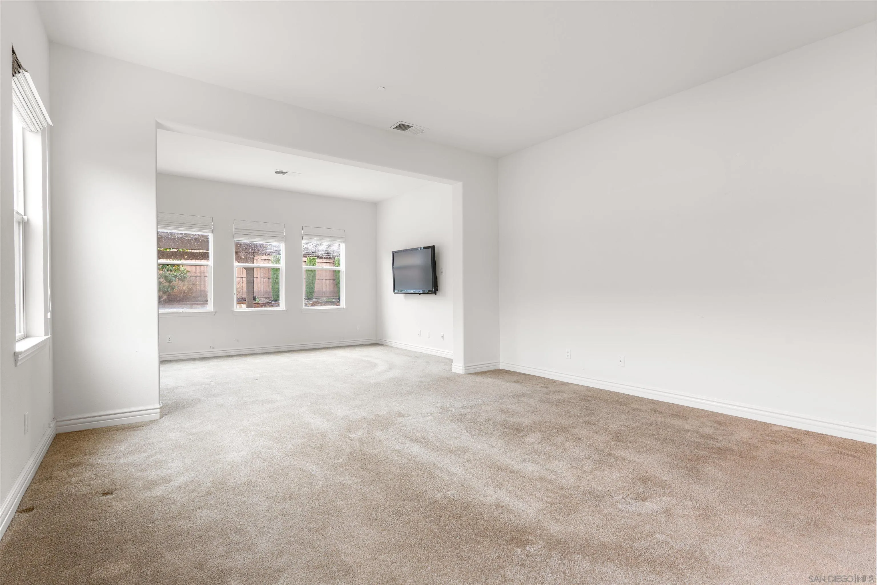 2067 James Gaynor Street Fallbrook, CA 92028 - Photo 22 of 33 a view of an empty room with a window