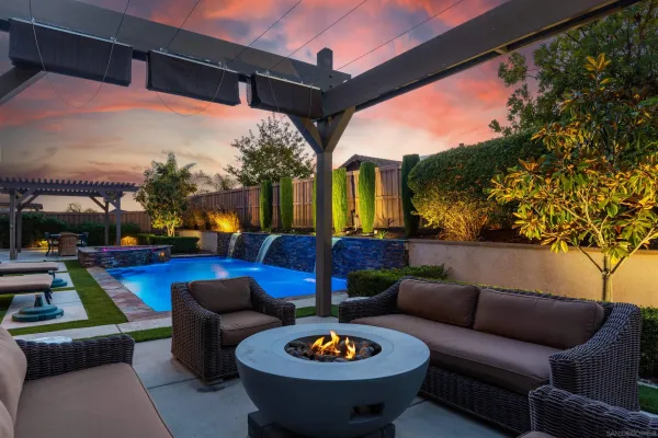 a outdoor living space with furniture and city view