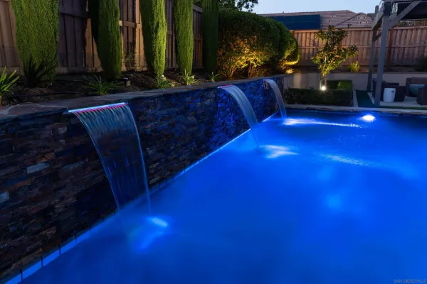 a view of balcony with furniture and potted plants