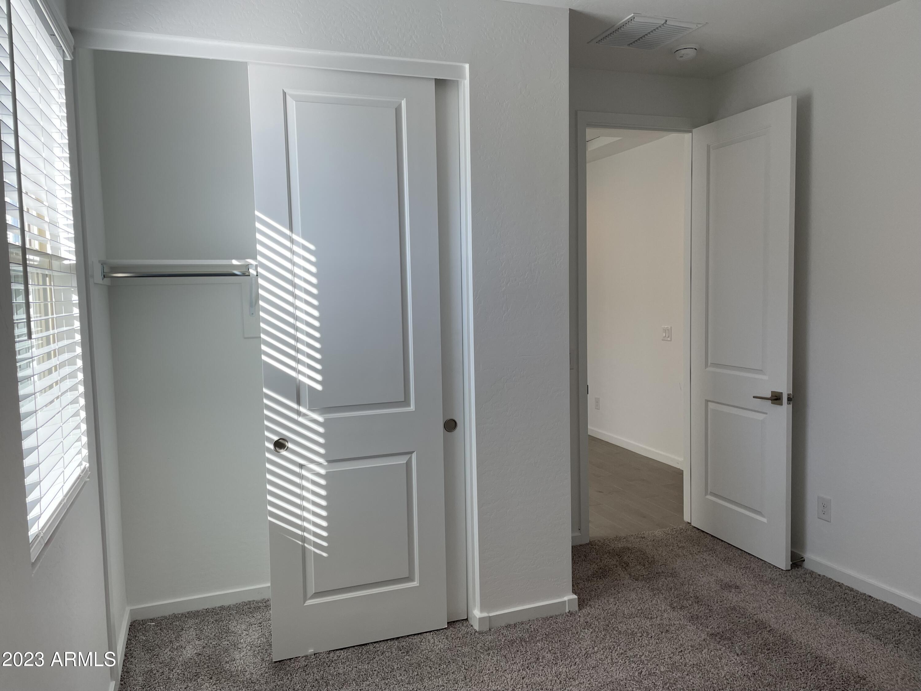 17401 West Red Fox Road Surprise, AZ 85387 - Photo 20 of 41 a view of front door with bedroom