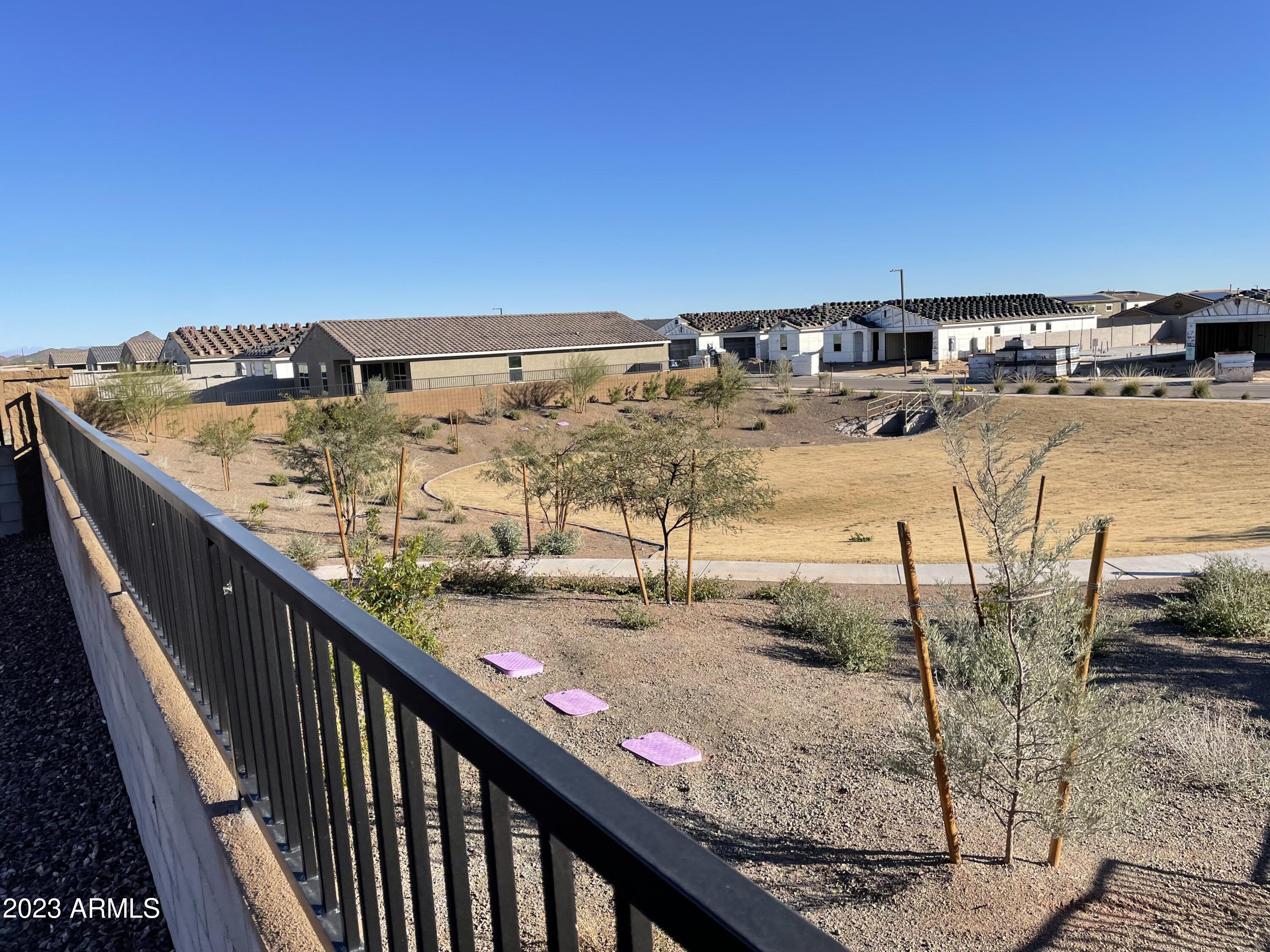 17401 West Red Fox Road Surprise, AZ 85387 - Photo 38 of 41 a view of swimming pool with an ocean view