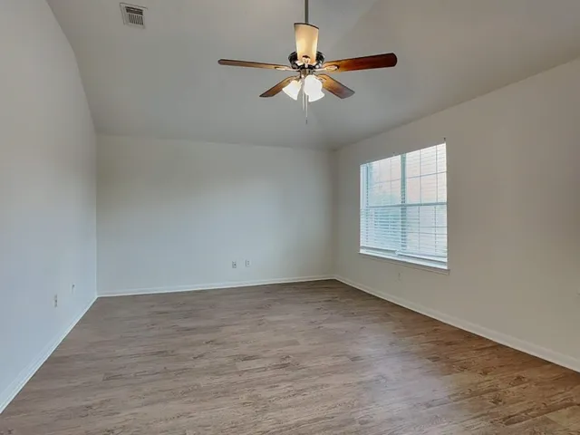 a house view with a garden space