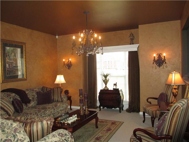 865 Rands Way Columbia, TN 38401 - Photo 3 of 20 The formal living room has upgraded lighting and wall finishes. The custom cornice and draperies remain in the home.
