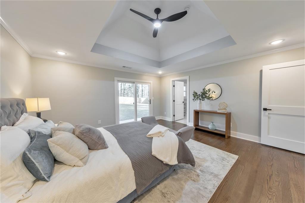 2066 Old Forge Way Marietta, GA 30068 - Photo 24 of 54 a bedroom with a bed and a window