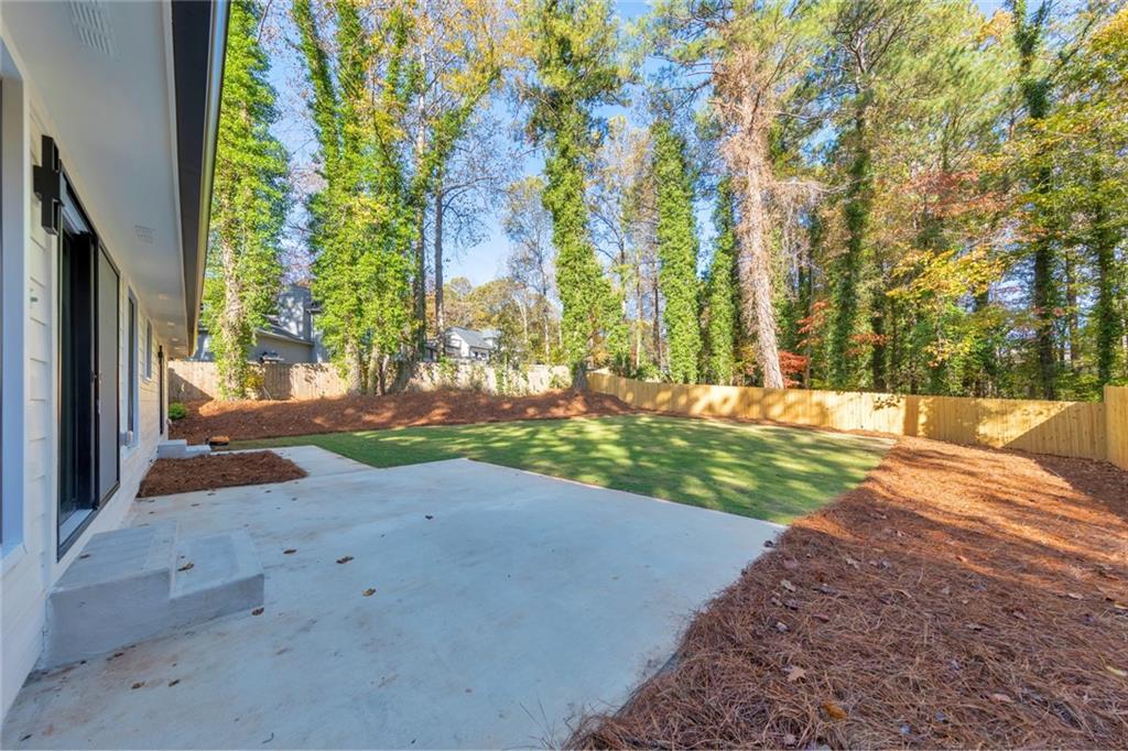 2066 Old Forge Way Marietta, GA 30068 - Photo 41 of 54 a view of a yard with plants and trees