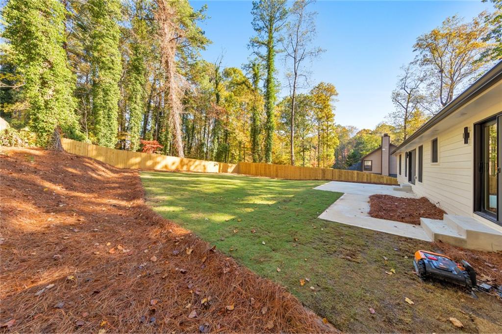 2066 Old Forge Way Marietta, GA 30068 - Photo 43 of 54 a front view of a house with a yard
