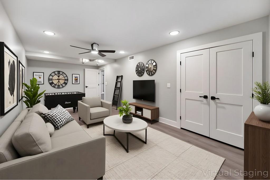 2066 Old Forge Way Marietta, GA 30068 - Photo 6 of 54 a living room with furniture a flat screen tv and a window