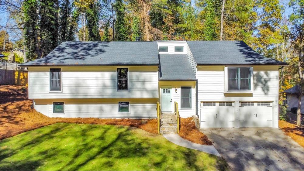 2066 Old Forge Way Marietta, GA 30068 - Photo 9 of 54 front view of a house with a yard