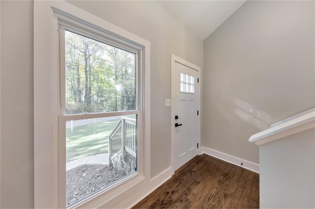 2066 Old Forge Way Marietta, GA 30068 - Photo 10 of 54 a view of empty room with wooden floor and fan