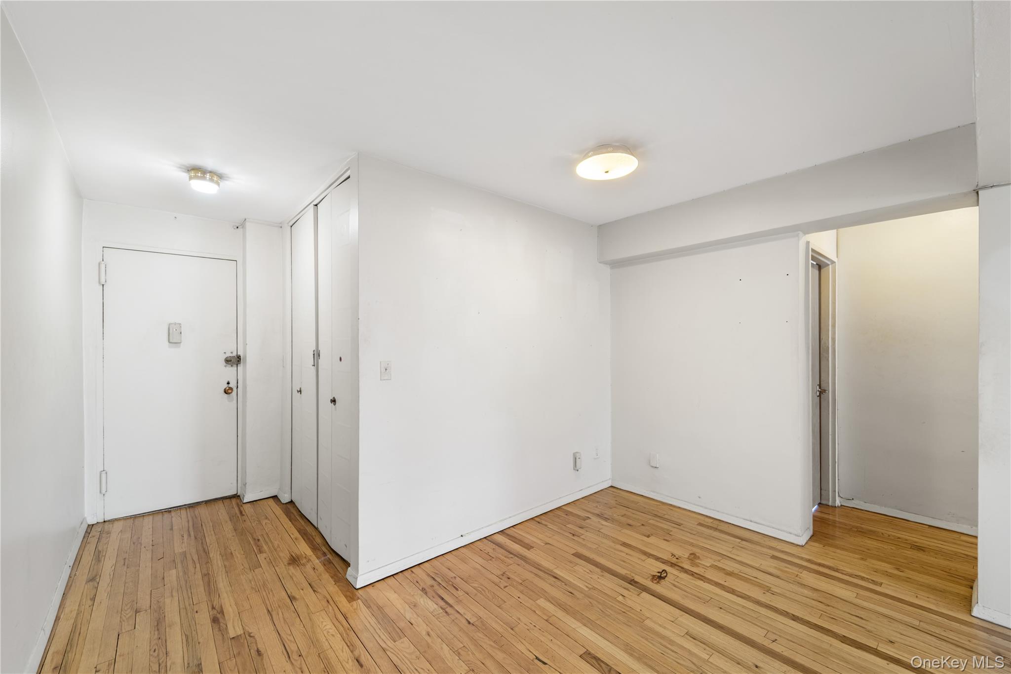 600 Locust Street, Unit 3G Mount Vernon, NY 10552 - Photo 3 of 25 a view of empty room with wooden floor