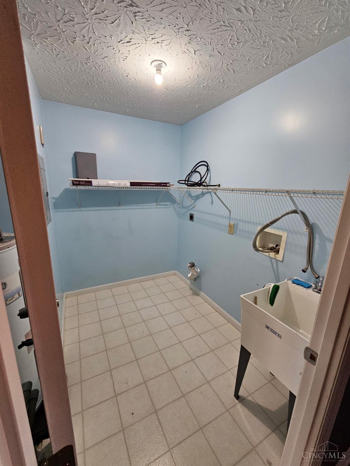 10524 West Road, Unit 11 Harrison, OH 45030 - Photo 29 of 33 Utility laundry room