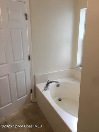 a bathroom with a bathtub