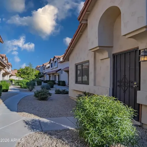 a house view with a garden space
