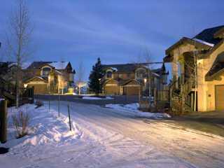 178 Knudson Ranch Road, Unit 22 Edwards, CO 81632 - Photo 2 of 2 a view of a house with a yard