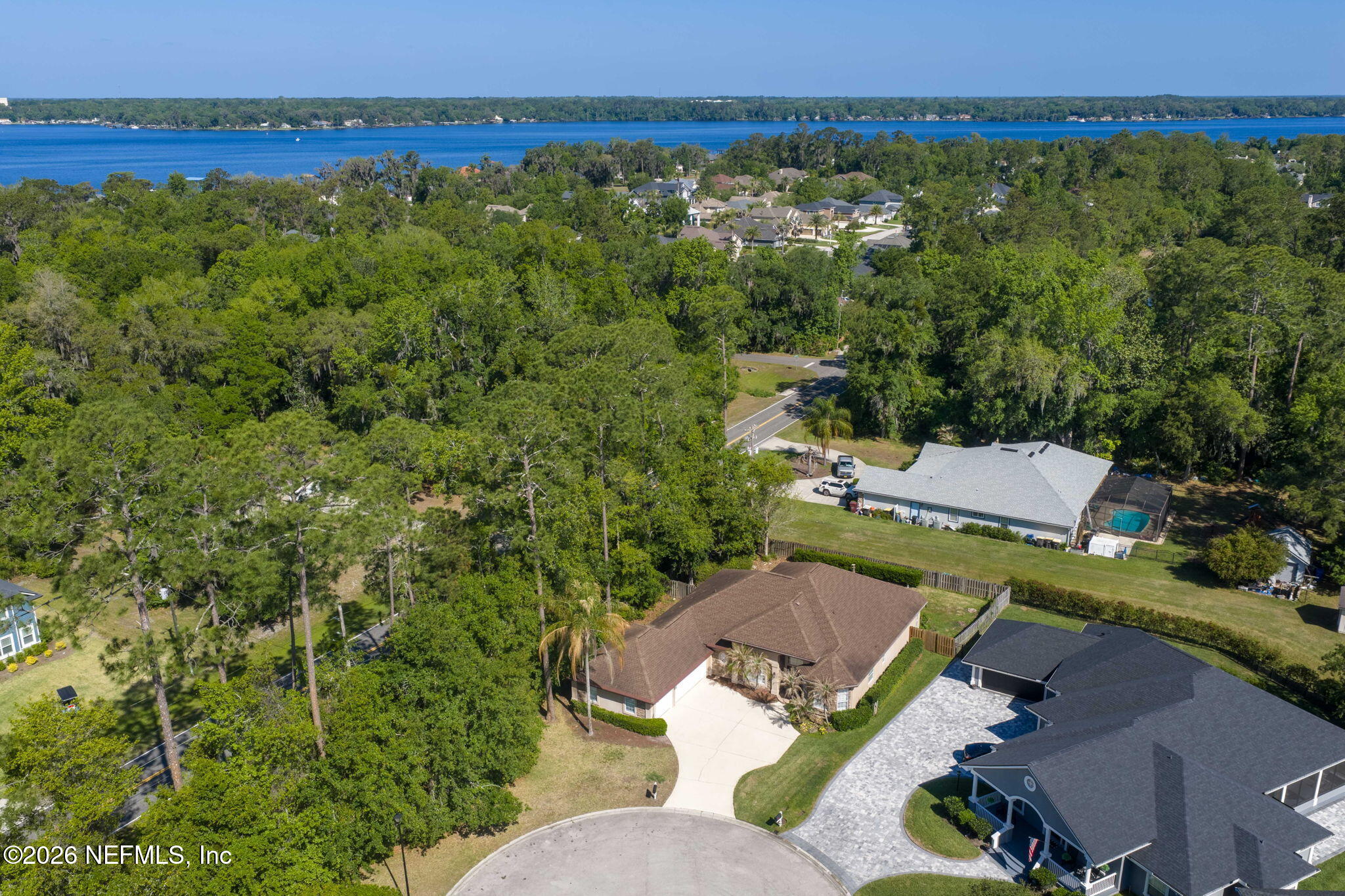 1600 Spring Water Court Fleming Island, FL 32003 - Photo 64 of 85 an aerial view of a house with a yard