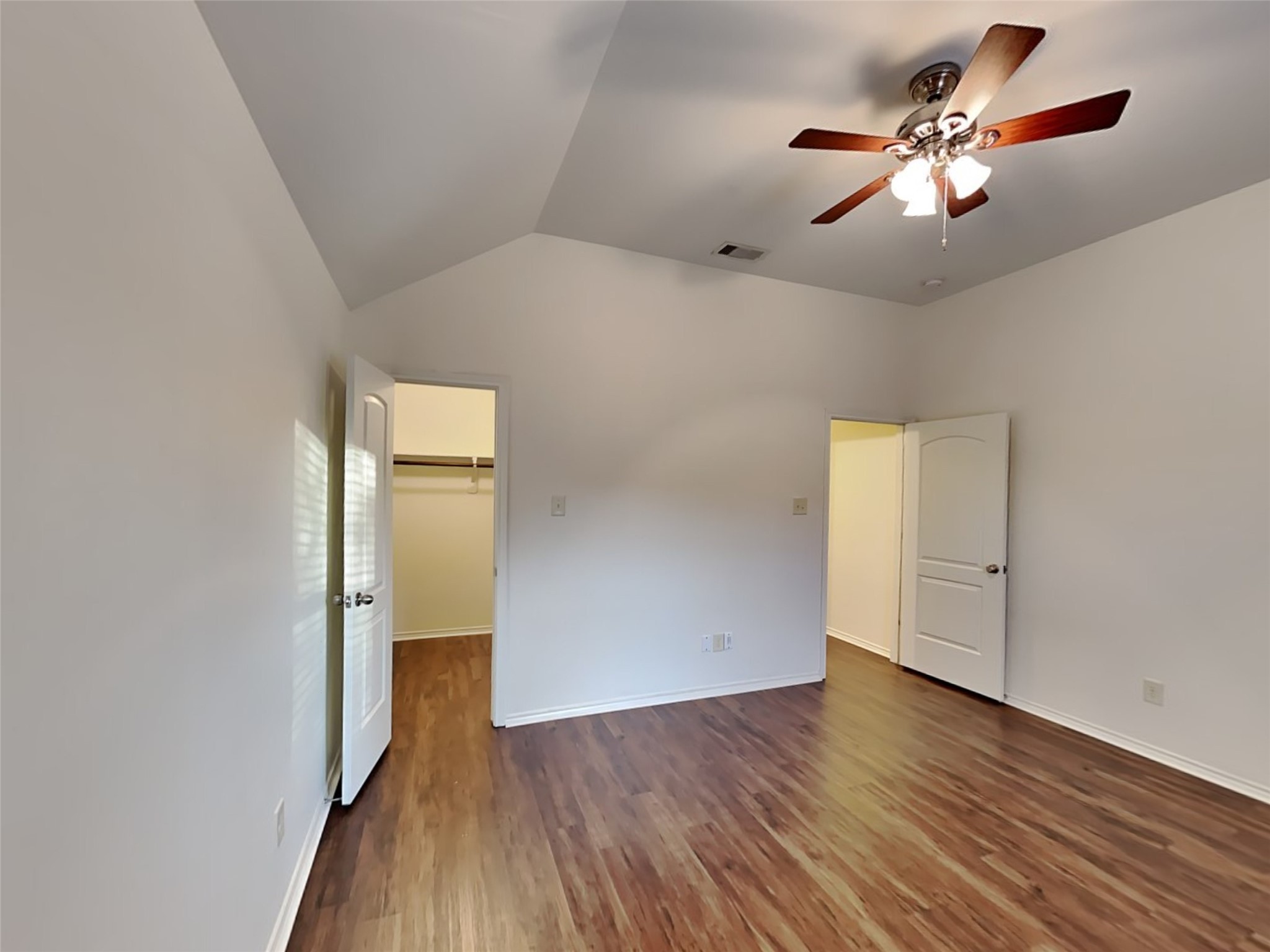 1323 Laura Hills Lane Spring, TX 77386 - Photo 14 of 22 wooden floor in an empty room with a window