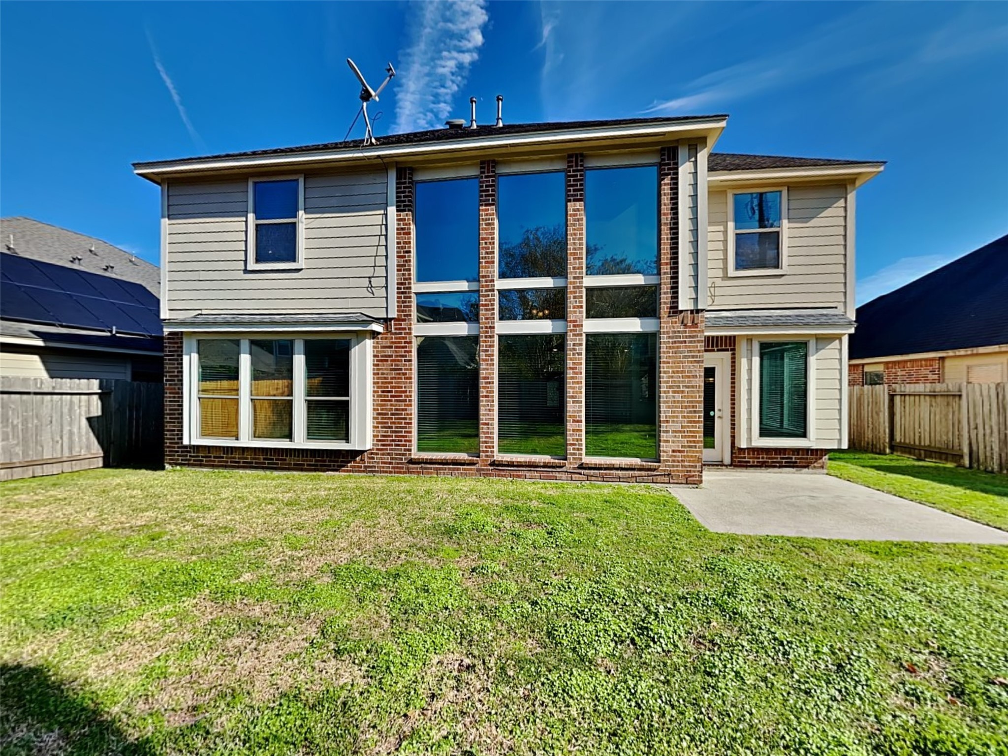 1323 Laura Hills Lane Spring, TX 77386 - Photo 22 of 22 a view of a house with a yard and large window