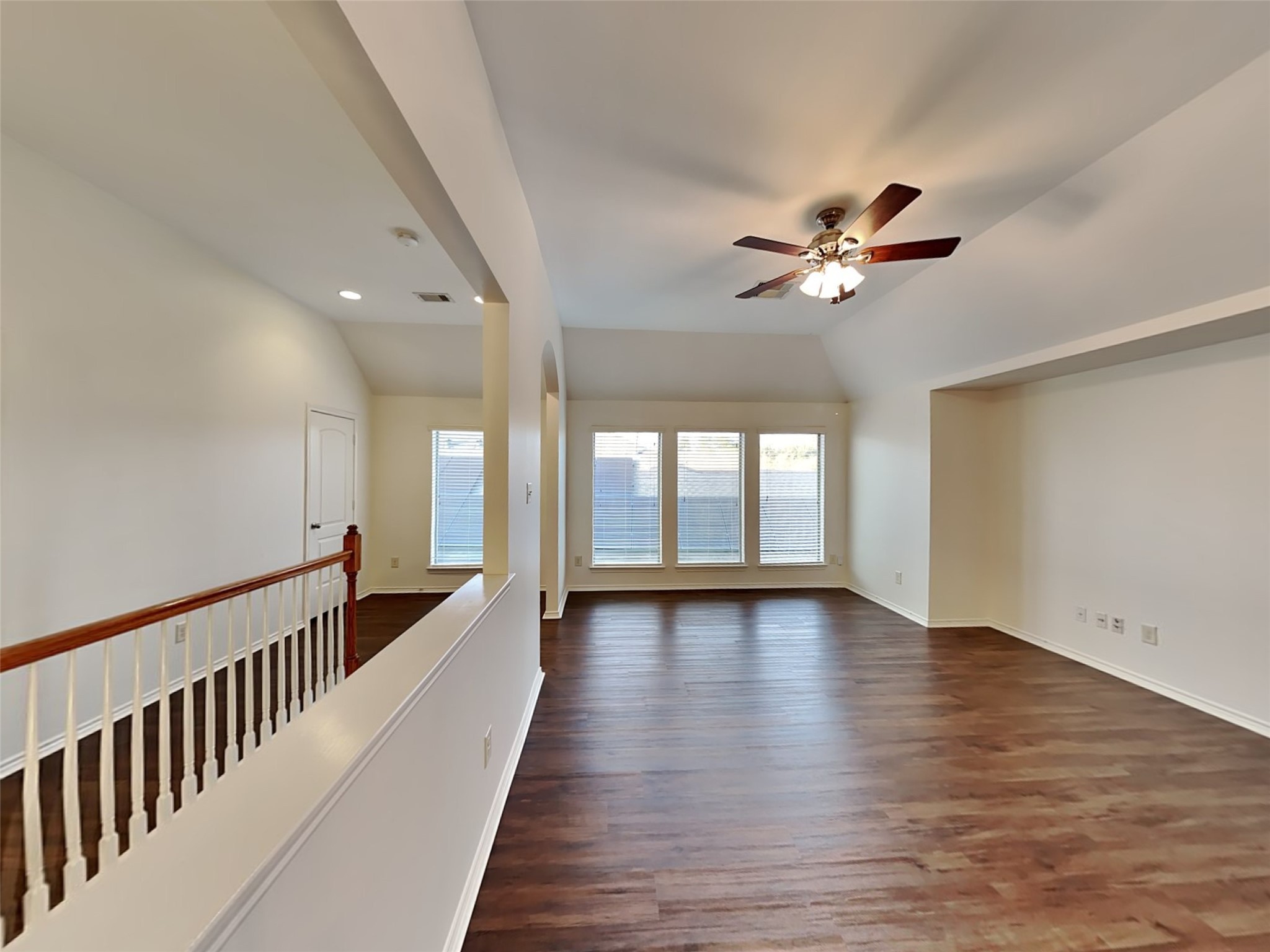 1323 Laura Hills Lane Spring, TX 77386 - Photo 8 of 22 wooden floor in an empty room with a window