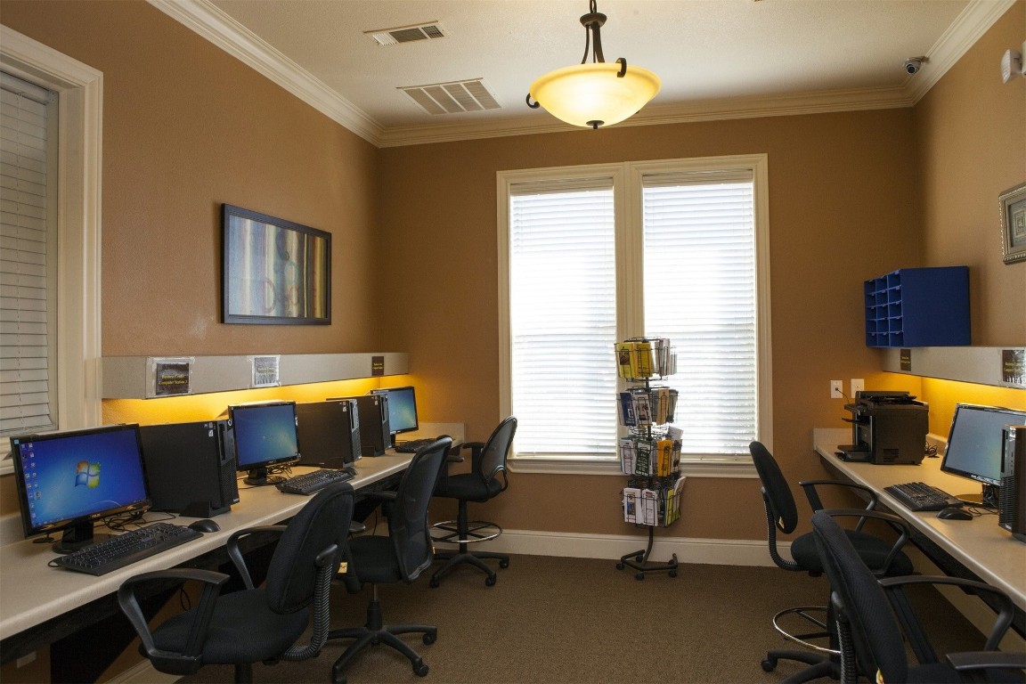 5121 North Foster Road San Antonio, TX 78244 - Photo 7 of 10 a view of a workspace with furniture and a window